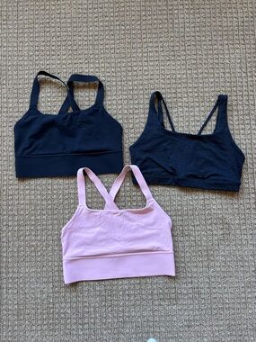 3 Athleta sports bras - size Medium D/DD